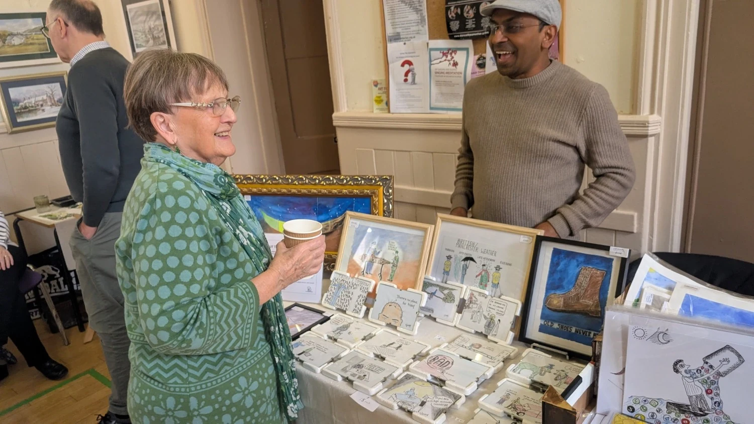 Cartoons that made Altrincham smile: Former BBC journalist brings humour and humanity to local art fair